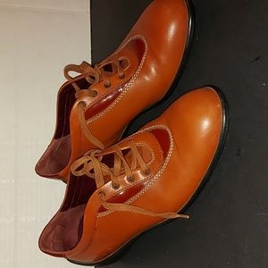 Tods woman driver shoes, size 9 narrow width,  brown leather .